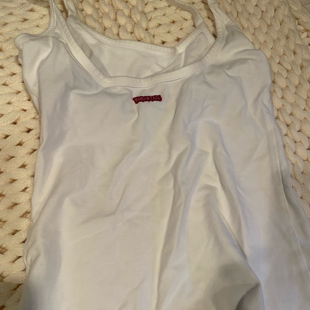 Hard tail scoop back tank